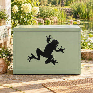 Black crawling frog decal with two frogs on light green surface