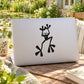 Black cartoon frog stretching wall decal with arms up and legs apart