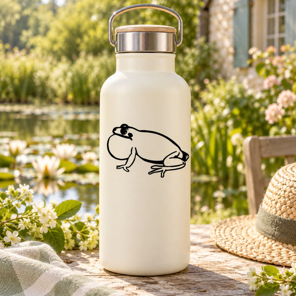Side croaking frog decal on a cream bottle