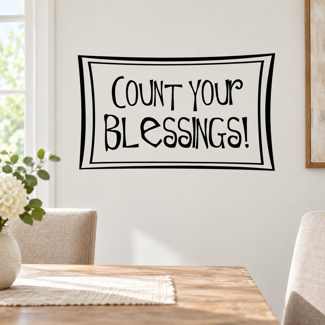 Wall decal with black quote "Count your blessings!" in double rectangular border