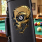 Skull sticker with 8-ball in eye, blue-yellow outline on black background