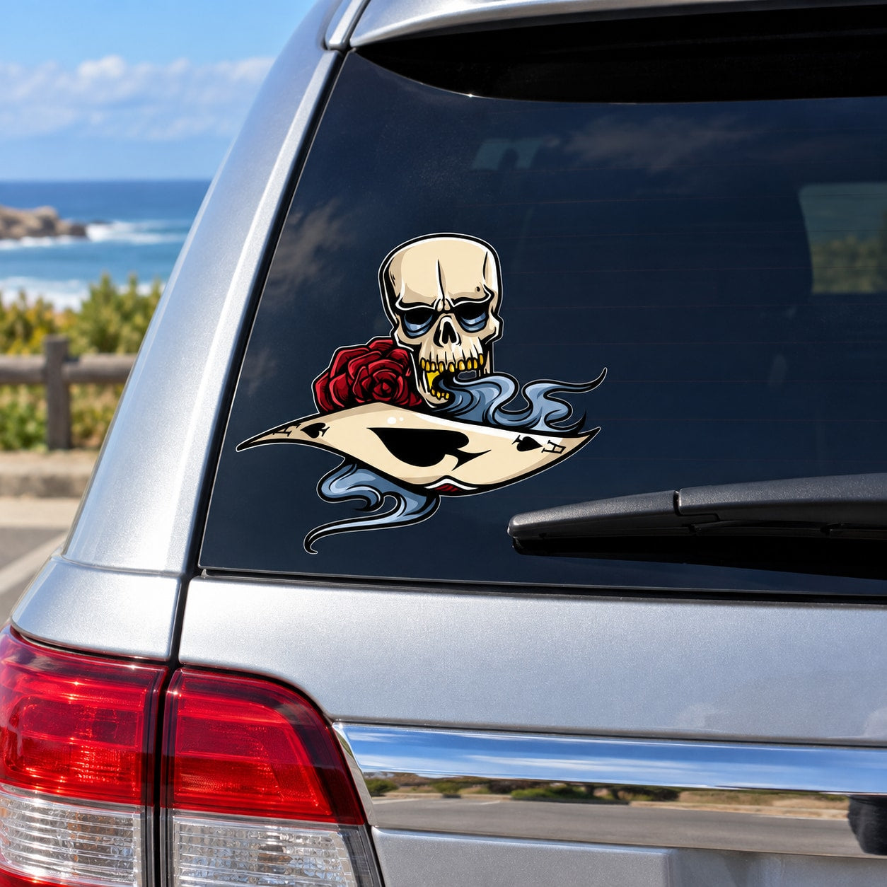 Cartoon skull decal with red rose and blue flames