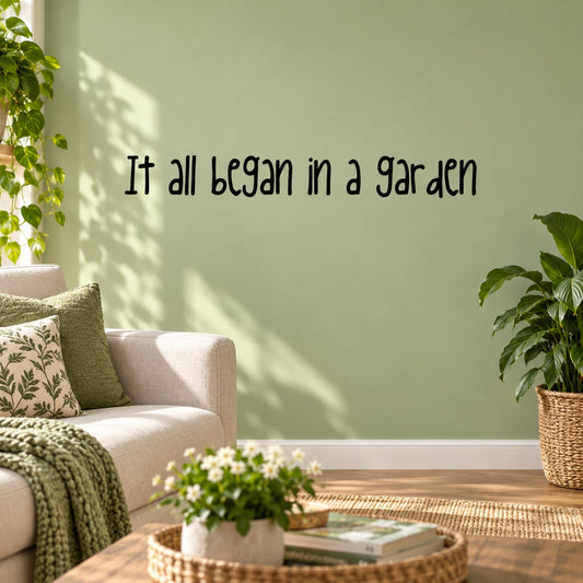 Garden wall decal with cursive text: “It all began in a garden”