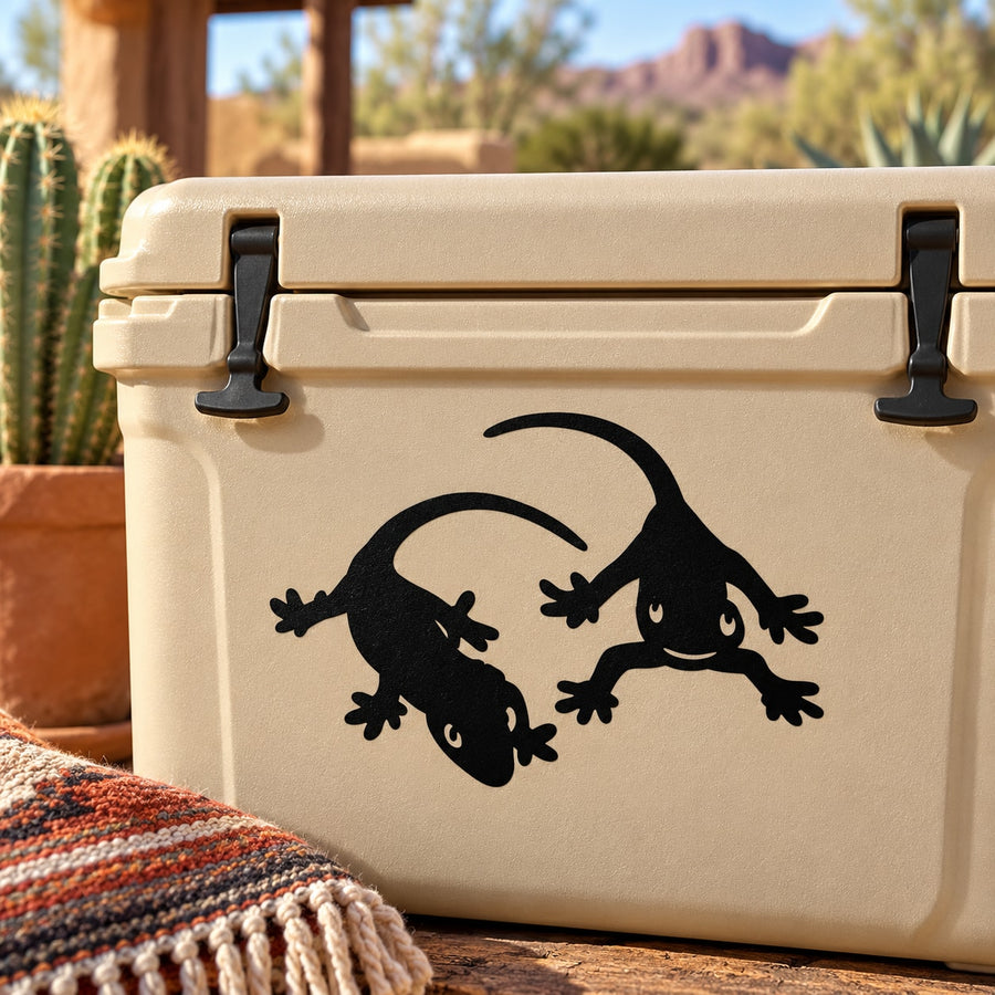 Black two geckos decal design on light surface
