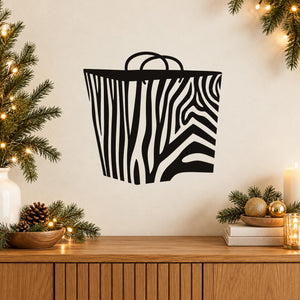 Zebra-striped gift bag decal with black-and-white striped bag outline and handles
