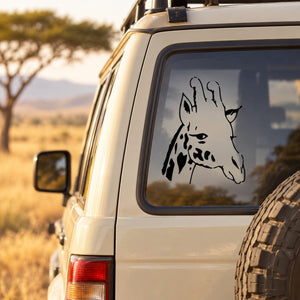 Giraffe head decal in black on a car window