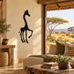 Black giraffe silhouette wall decal with one leg raised