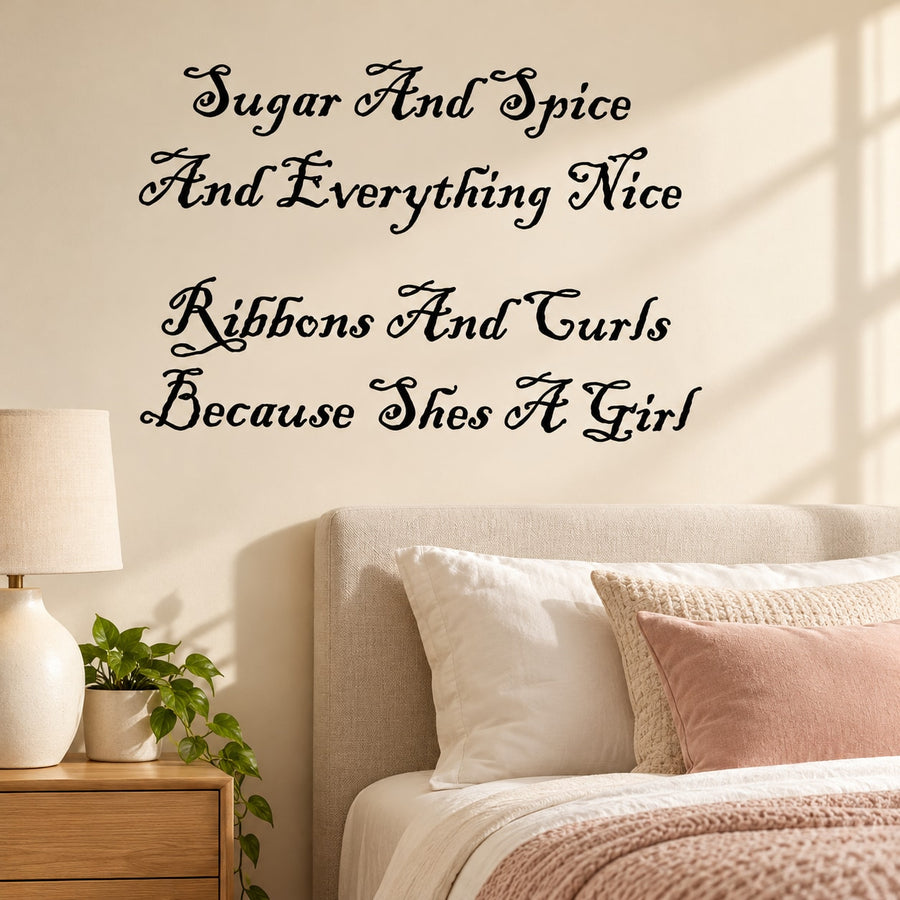 Wall decal with 'Sugar And Spice and Everything Nice' black script lettering
