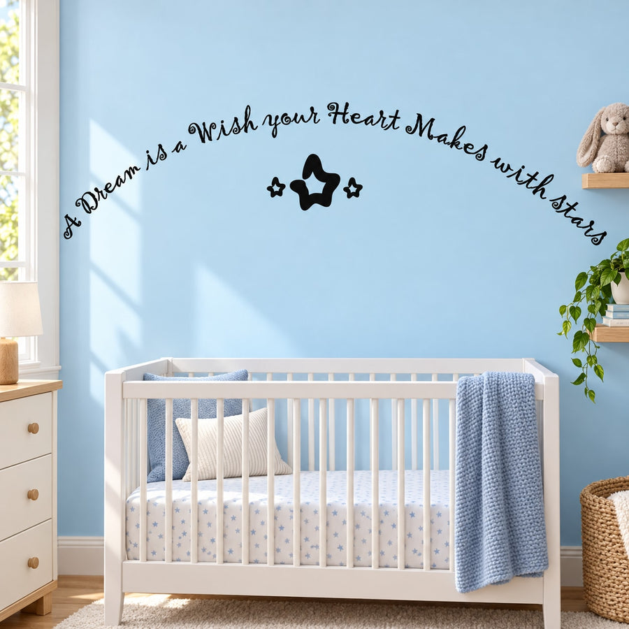 Wall decal with cursive quote and star-heart silhouette on blue wall