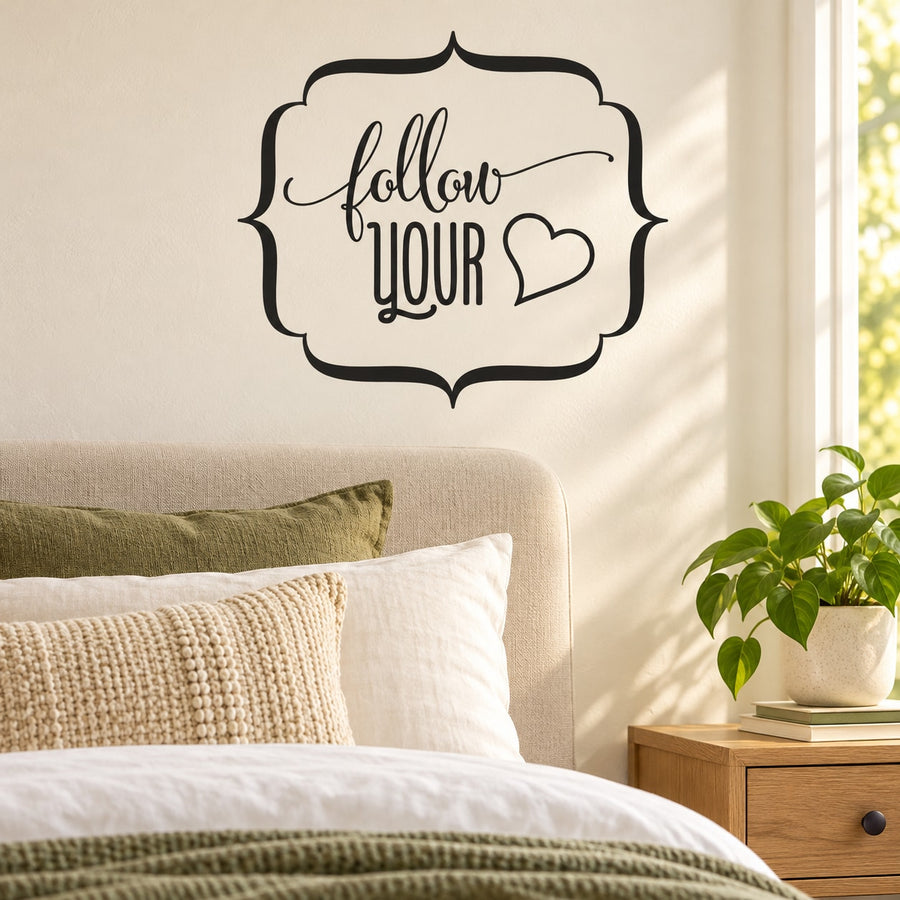 Vinyl wall decal with 'follow your' script and heart in ornate frame