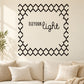Wall decal with black geometric frame and cursive "YOUR light" text