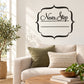 Black “Never Stop” wall decal with ornate frame