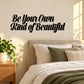 Cursive wall decal with text "Be Your Own Kind of Beautiful"