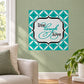 Teal wall decal with ornate frame reading “live laugh love” in script