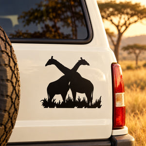 Embracing giraffes decal, black silhouette of two giraffes nuzzling on white vehicle