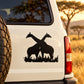 Embracing giraffes decal, black silhouette of two giraffes nuzzling on white vehicle