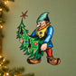 Cartoon elf sticker holding a decorated Christmas tree with star topper
