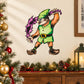 Green elf sticker with purple feather boa and colorful hat, running pose