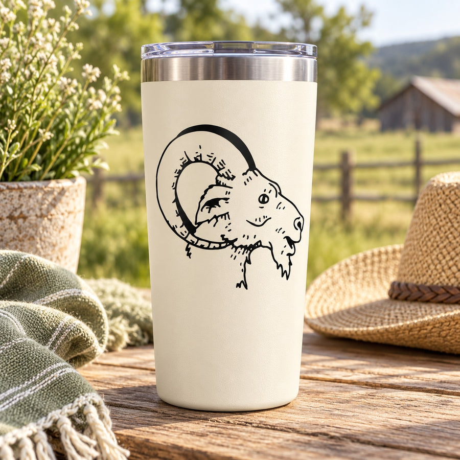 Round goat head outline decal with horns, black ink on white surface
