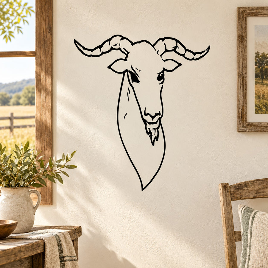 Goat head decal with black outline design on a light background