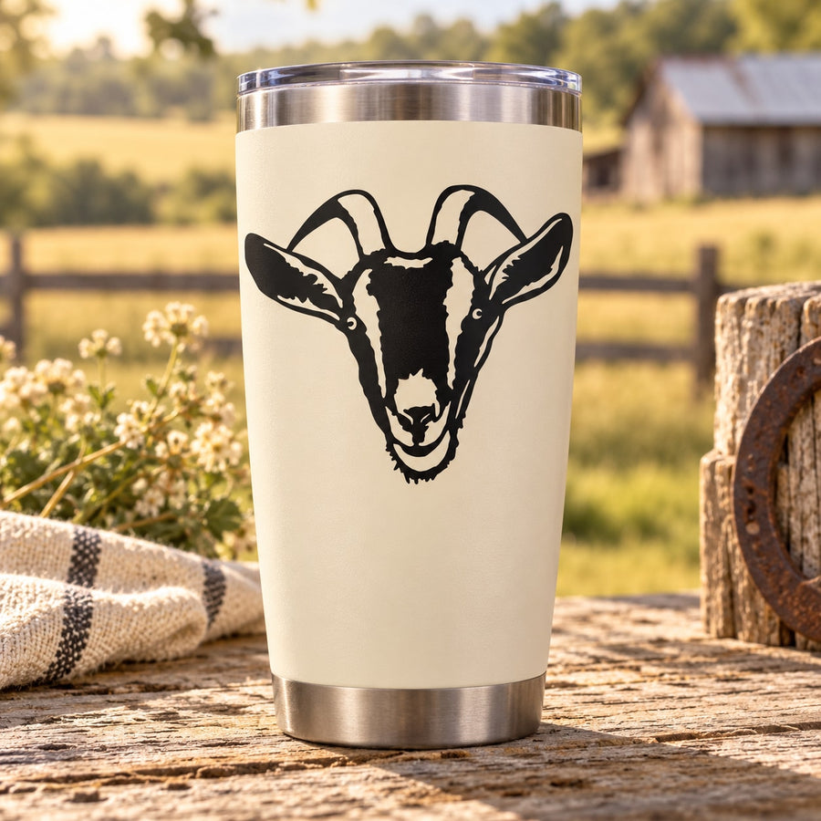 Horned goat head decal, black silhouette on light background