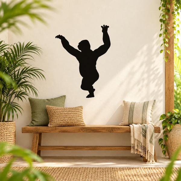 Playful gorilla silhouette wall decal, black jumping design