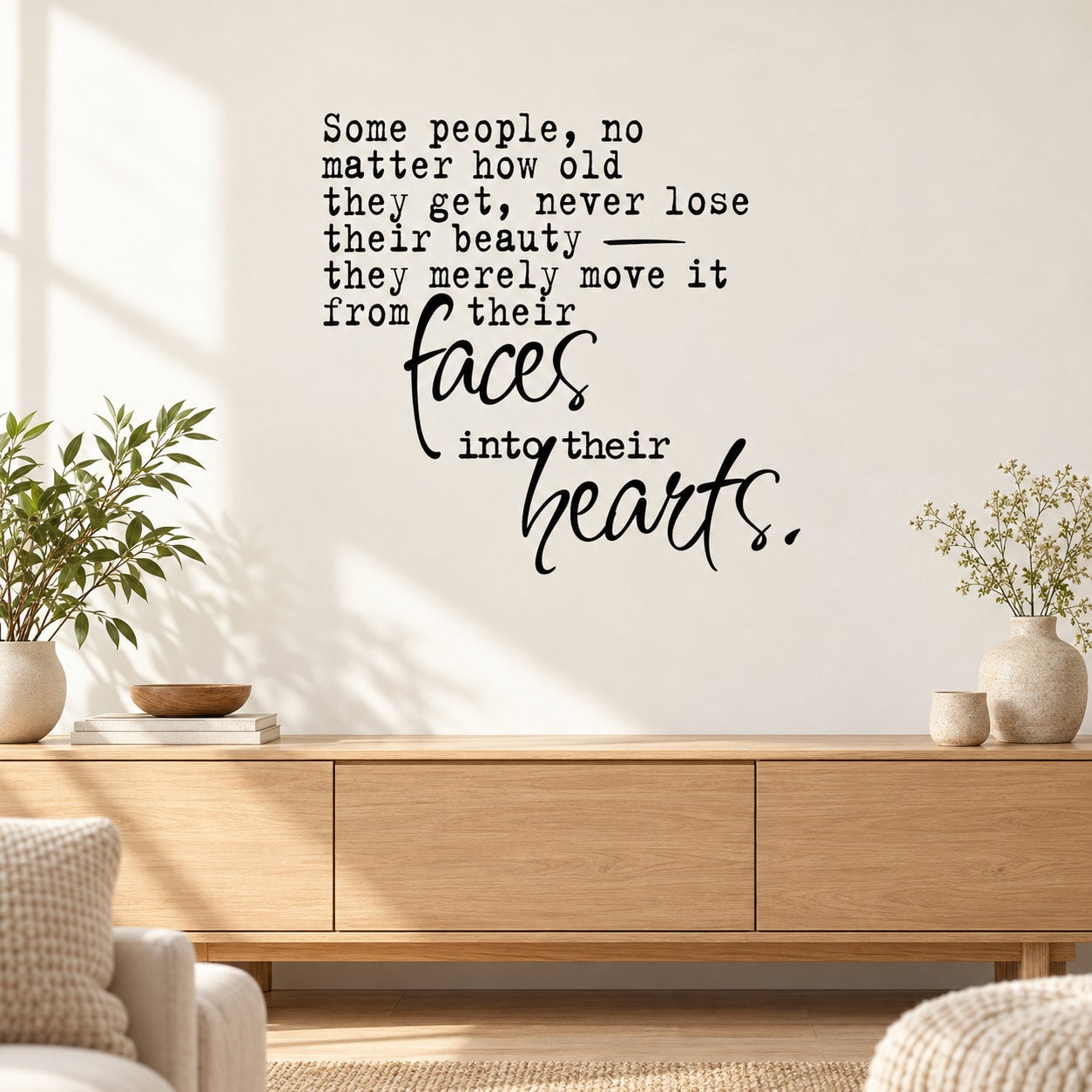 Wall decal with handwritten quote in cursive, reading 'faces into their hearts'