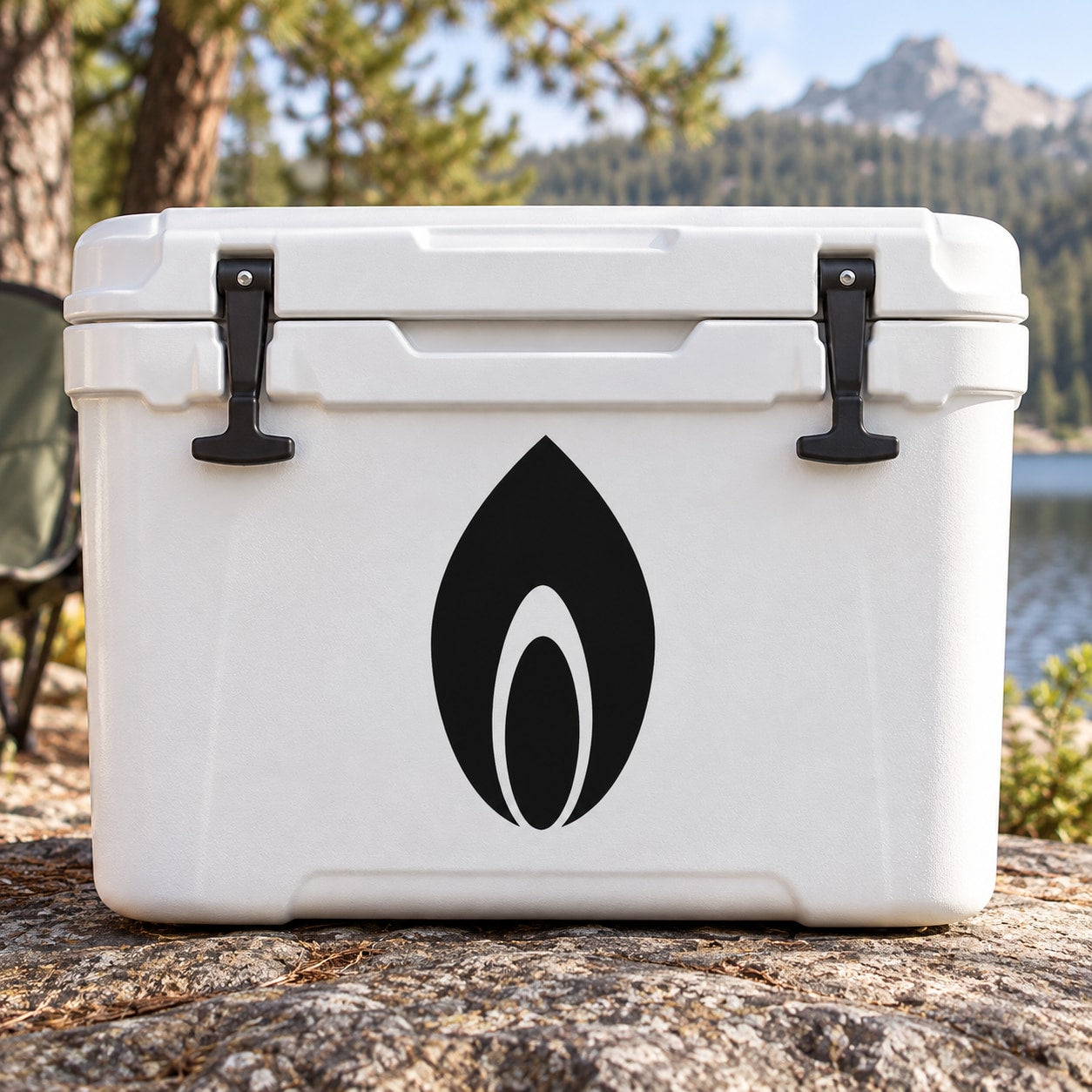 Black leaf-shaped decal with white center on a white cooler lid