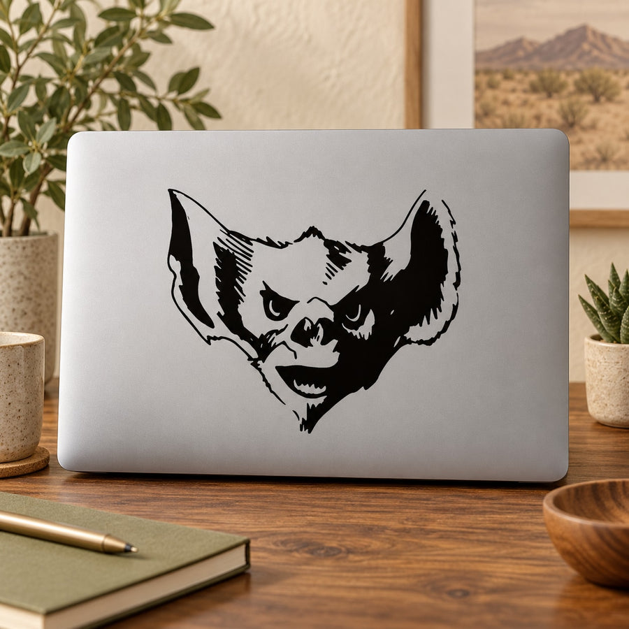 Gremlin head vinyl decal, black illustrated face design