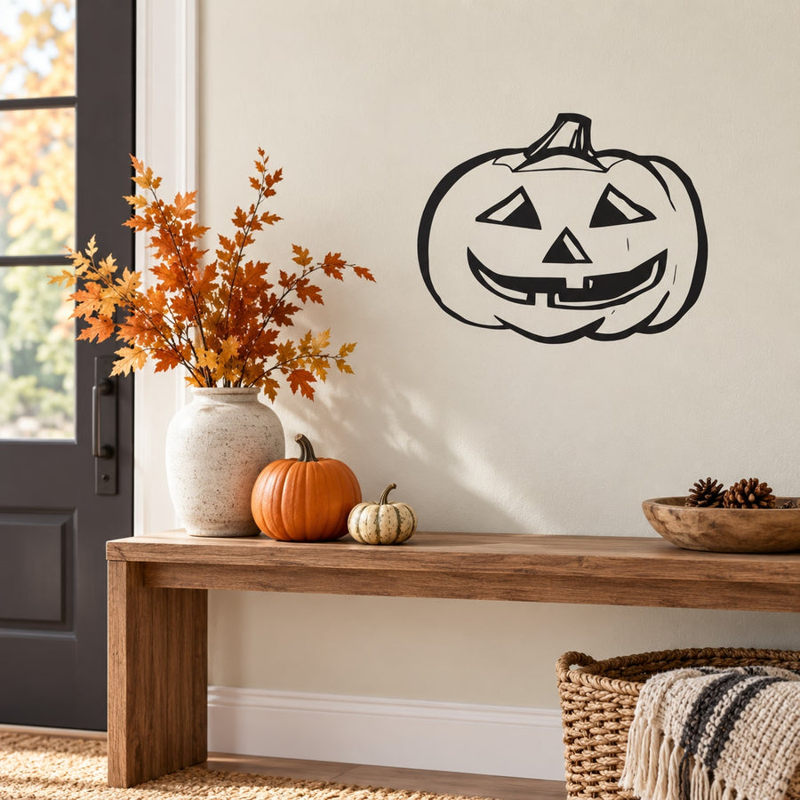 Halloween jack-o'-lantern wall decal with wide grinning face, triangle eyes, and carved smile