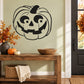 Black jack-o-lantern face wall decal with outlined witch hat and carved smile