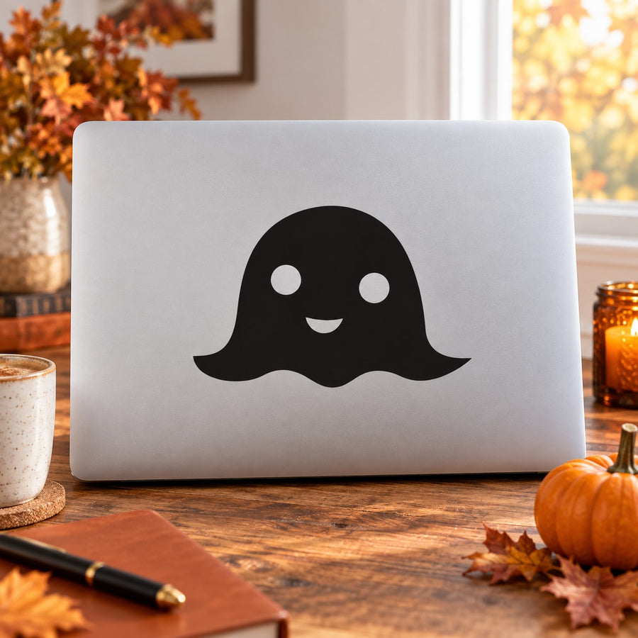 Halloween ghost blob vinyl decal on white laptop lid, black cute ghost face