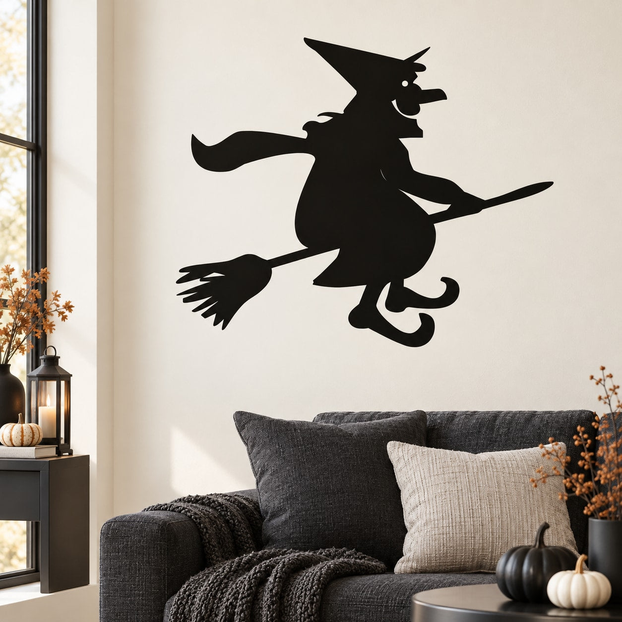 Black witch on broom wall decal silhouette for Halloween