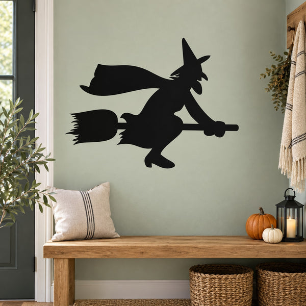 Black witch silhouette on broom Halloween wall decal