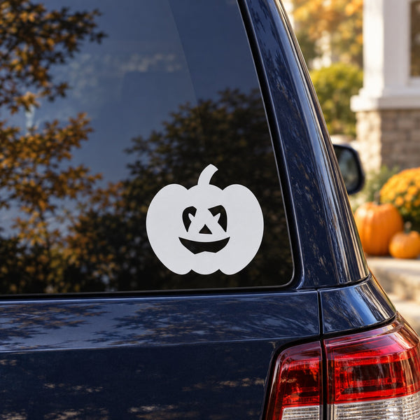Halloween jack-o-lantern pumpkin decal, white carved smiling face on window glass