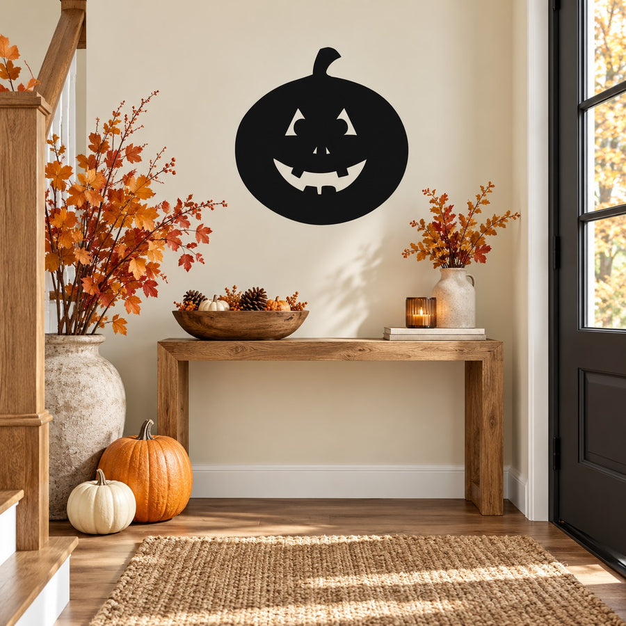 Round jack-o-lantern decal with black circular pumpkin face and carved smile