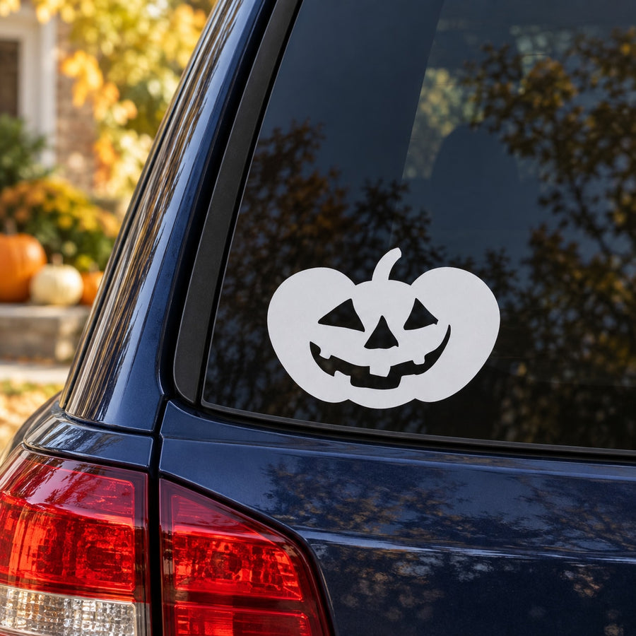 White jack-o-lantern face decal with triangular eyes and jagged grin
