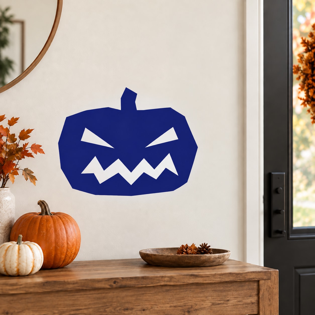 Halloween jack-o-lantern wall decal, bold blue pumpkin face with jagged teeth