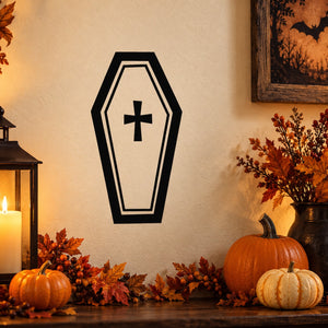 Black and white coffin-shaped light decal with a cross symbol