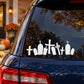 Graveyard decal with white gravestones and cross symbols on a car window
