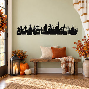 Black graveyard wall decal with many tombstones, crosses, and skull silhouette figures