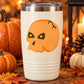 Halloween skull decal on white tumbler, orange cracked head with yellow eyes