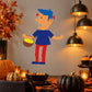 Halloween monster character decal of boy holding a yellow candy bucket, blue hair and red pants