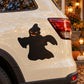 Spooky ghost sticker in black, cutout silhouette on a white car panel.