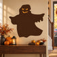 Halloween brooding ghost sticker with dark silhouette and glowing orange eyes and mouth