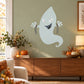 Halloween ghost sticker with broken chains, white ghost face with black bat-like mouth