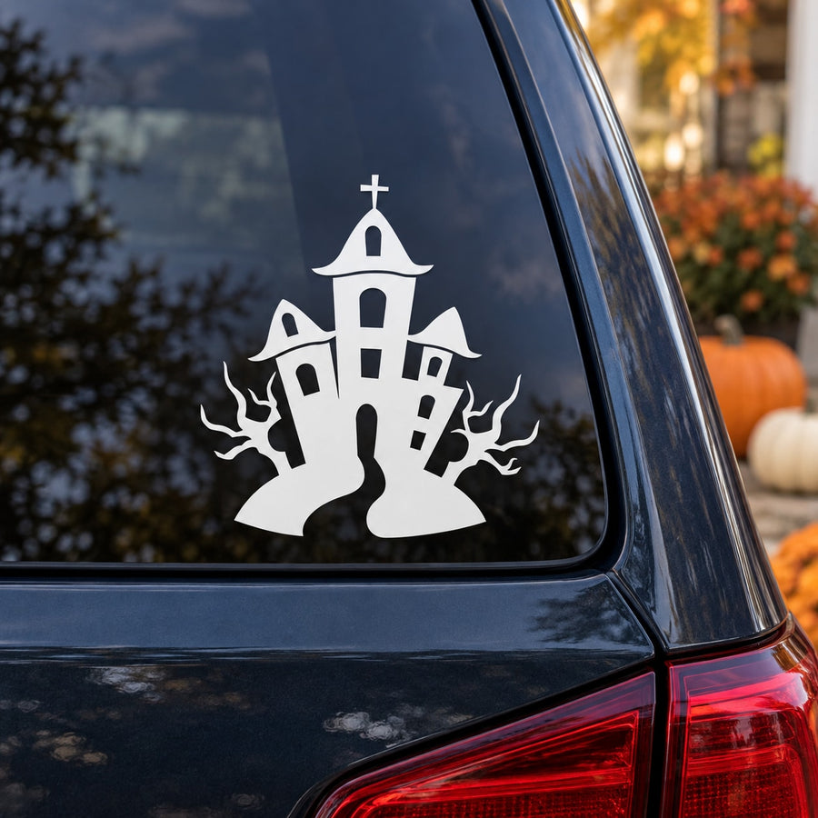 Haunted house car window decal with ghost and castle silhouette