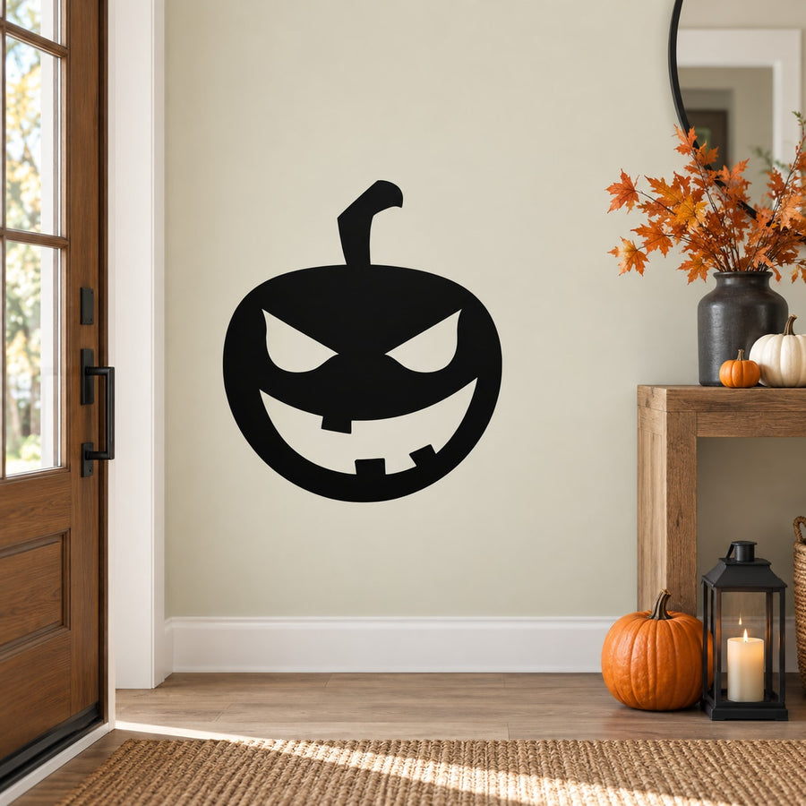 Halloween pumpkin face decal with black toothy grin and pointed stem