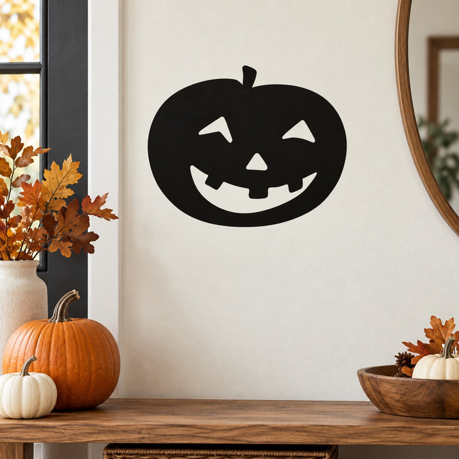 Jack-o-lantern face decal, black with carved smile, triangle nose, and scary eyes