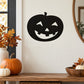 Jack-o-lantern face decal, black with carved smile, triangle nose, and scary eyes